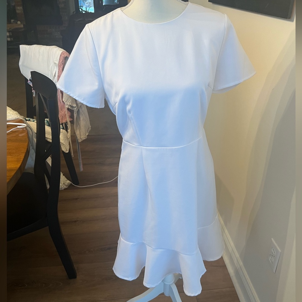 Beautiful White Dress with Ruffle at the Bottom